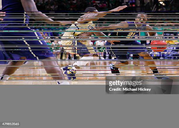 Lamar Patterson of the Pittsburgh Panthers drives to the basket against the Notre Dame Fighting Irish at Purcel Pavilion on March 1, 2014 in South...