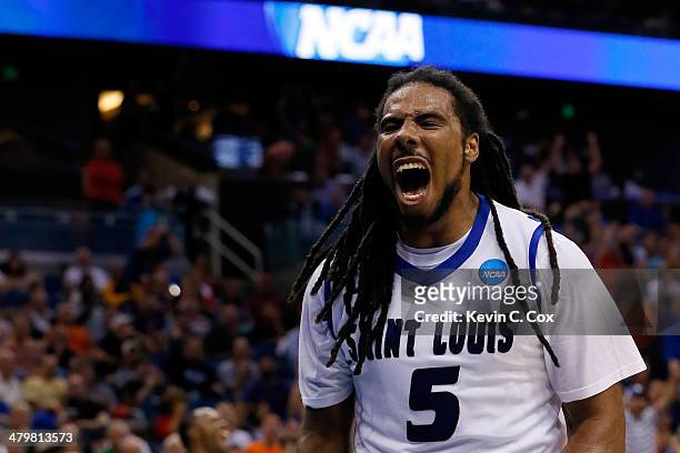 Jordair Jett of the Saint Louis Billikens celebrates a basket in the second half to tie the game against the North Carolina State Wolfpack during the...