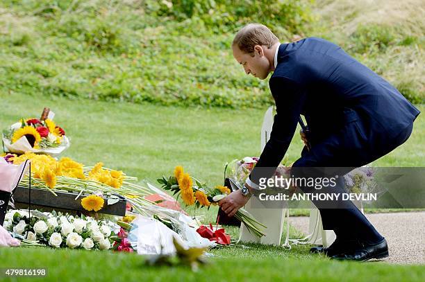 Britain's Prince William, Duke of Cambridge, lays flowers at the 7/7 memorial in London's Hyde Park on July 7 in memory of the 52 people killed...