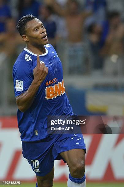 Brazilian Cruzeiro's player Julio Baptista celebrates his goal against Uruguayan Defensor during their Libertadores Cup football match at Mineirao...