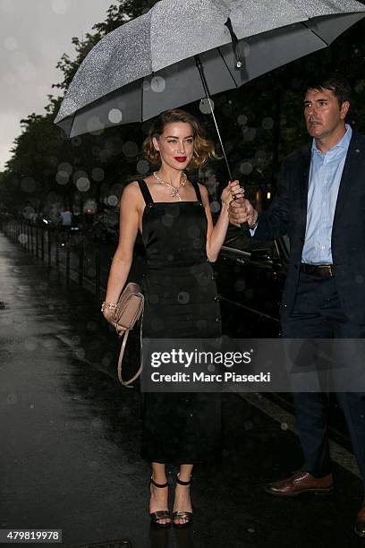 Actress Amber Heard arrives to attend the 'BULGARI' Haute Couture Cocktail Party and Model Show on July 7, 2015 in Paris, France.