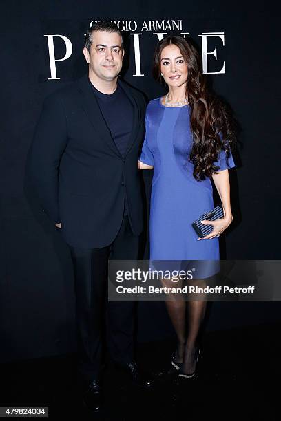 Guests attend the Giorgio Armani Prive show as part of Paris Fashion Week Haute-Couture Fall/Winter 2015/2016. Held at Palais de Chaillot on July 7,...
