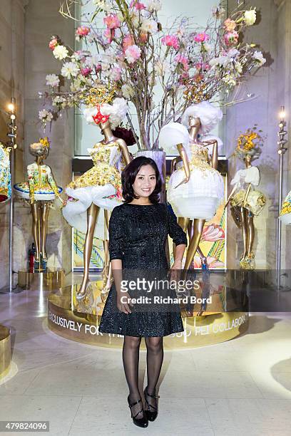 Designer Guo Pei poses during the 'Guo Pei Collaborates with Mac Cosmetics' event at Musee Des Arts Decoratifs on July 7, 2015 in Paris, France.