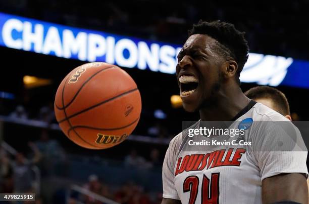 Montrezl Harrell of the Louisville Cardinals celebrates after a basket and the foul in the first half against the Manhattan Jaspers during the second...