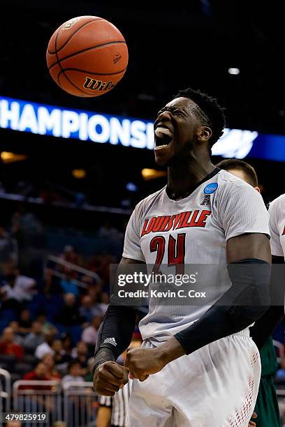 Montrezl Harrell of the Louisville Cardinals celebrates after a basket and the foul in the first half against the Manhattan Jaspers during the second...