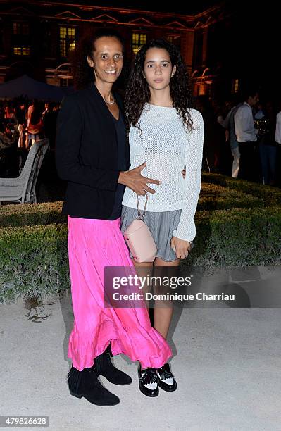 Karine Silla and Iman Perez attend the Tory Burch Paris Flagship store opening after party at on July 7, 2015 in Paris, France.