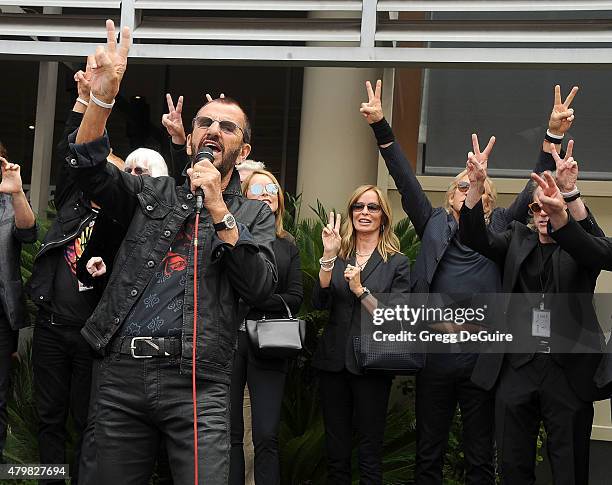 Musician Ringo Starr and Barbara Bach attend Ringo's birthday fan gathering at Capitol Records on July 7, 2015 in Hollywood, California.