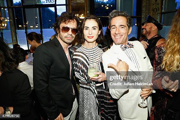 Olivier Zahm, Francesca Amfitheatrof and Vincent Dare attend the mytheresa.com & Haider Ackermann Dinner At Le Grand Vefour as part of Paris Fashion...