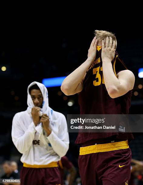 Jonathan Gilling of the Arizona State Sun Devils reacts to their 87 to 85 loss to the Texas Longhorns during the second round of the 2014 NCAA Men's...