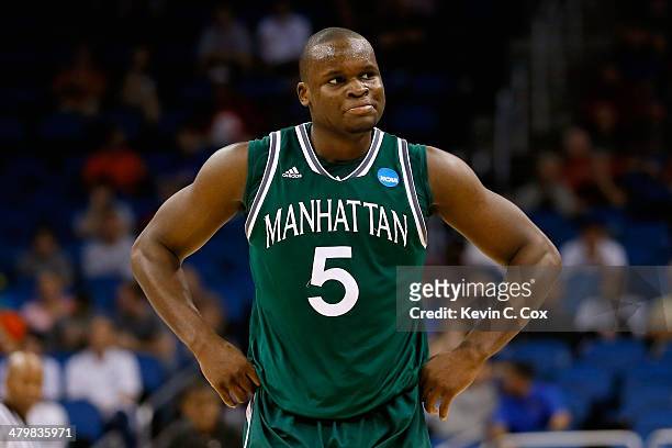 Rhamel Brown of the Manhattan Jaspers reacts after fouling out against the Louisville Cardinals in the second half during the second round of the...
