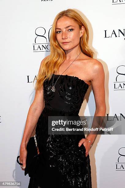 Actress Clara Paget attends the Lancome 80th Anniversary Party as part of Paris Fashion Week Haute Couture Fall/Winter 2015/2016 on July 7, 2015 in...