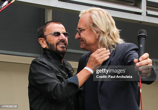 Musicians Ringo Starr and Joe Walsh attend Ringo Starr's birthday fan gathering on July 7, 2015 in Hollywood, California.