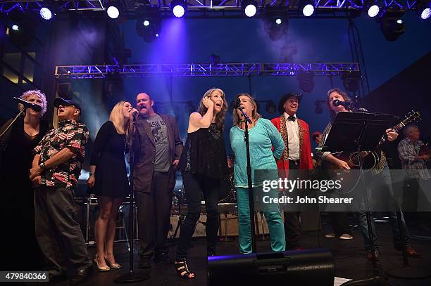 Musicians, from left, Julie Christensen, Charlie McCoy, Ana Cristina, John Carter Cash, Kathy Mattea, Tracy Nelson, Jason Ringenberg, and Jeff Hanna...