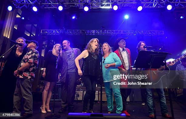 Musicians, from left, Julie Christensen, Charlie McCoy, Ana Cristina, John Carter Cash, Kathy Mattea, Tracy Nelson, Jason Ringenberg, and Jeff Hanna...