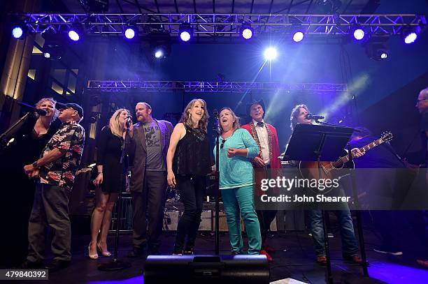 Musicians, from left, Julie Christensen, Charlie McCoy, Ana Cristina, John Carter Cash, Kathy Mattea, Tracy Nelson, Jason Ringenberg, and Jeff Hanna...