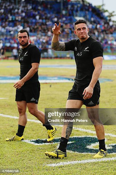 Sonny Bill Williams of the New Zealand All Blacks thanks the crowd with Charlie Ngatai of the All Blacks after winning the International Test match...