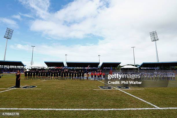 The All Blacks and Manu Samoa line up for the anthems during the International Test match between Samoa and the New Zealand All Blacks at Apia...