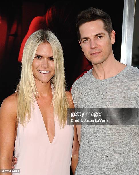 Lauren Scruggs and Jason Kennedy attend the premiere of "The Gallows" at Hollywood High School on July 7, 2015 in Los Angeles, California.