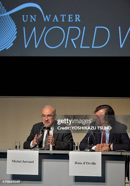 Michel Jarraud , secretary-general of the World Meteorological Organization and UNESCO assistant director-general Hans D'orville attend a panel...