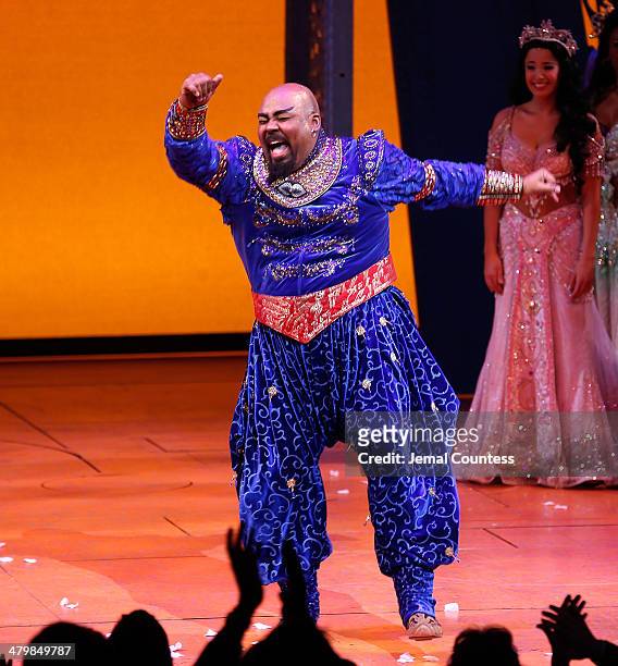 Actor James Monroe Iglehart takes a bow during curtain call at the the "Aladdin" On Broadway Opening Night at New Amsterdam Theatre on March 20, 2014...
