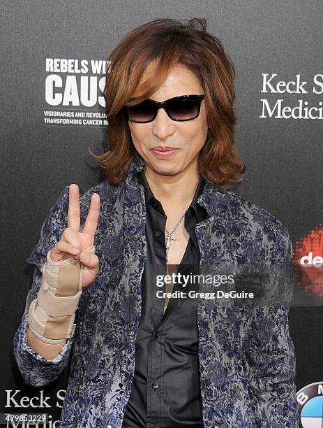 Musician Yoshiki Hayashi arrives at the 2nd Annual Rebel With A Cause Gala at Paramount Studios on March 20, 2014 in Hollywood, California.