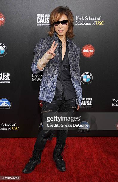 Musician Yoshiki Hayashi arrives at the 2nd Annual Rebel With A Cause Gala at Paramount Studios on March 20, 2014 in Hollywood, California.