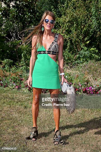 Anna Dello Russo attends the Maison Margiela show as part of Paris Fashion Week Haute Couture Fall/Winter 2015/2016 on July 8, 2015 in Paris, France.