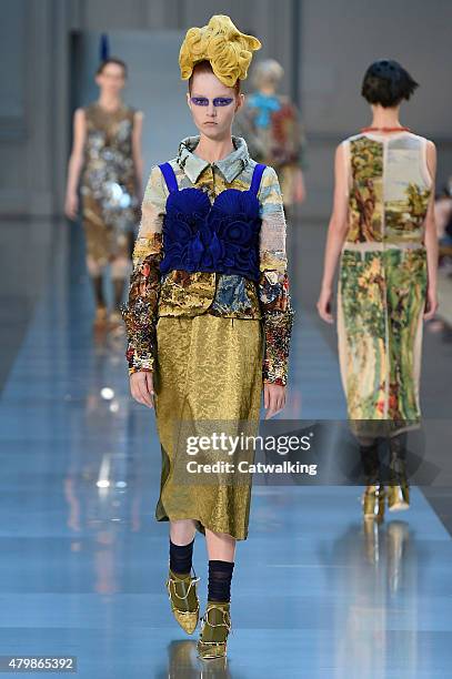 Model walks the runway at the Maison Margiela Autumn Winter 2015 fashion show during Paris Haute Couture Fashion Week on July 8, 2015 in Paris,...