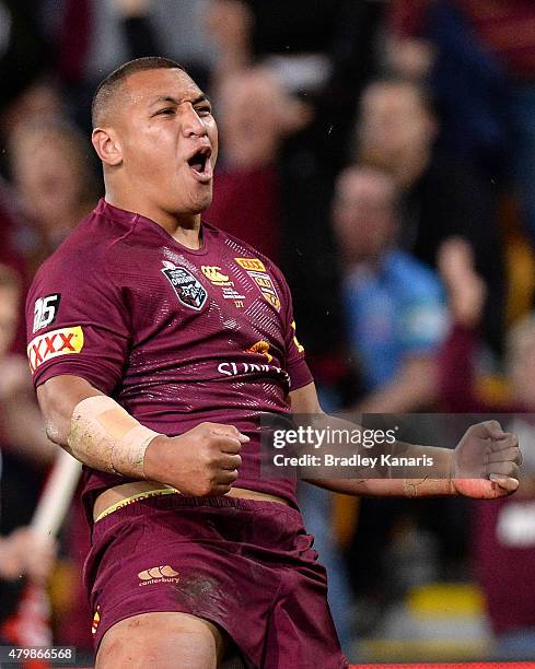 Josh Papalii of the Maroons celebrates scoring a try during game three of the State of Origin series between the Queensland Maroons and the New South...