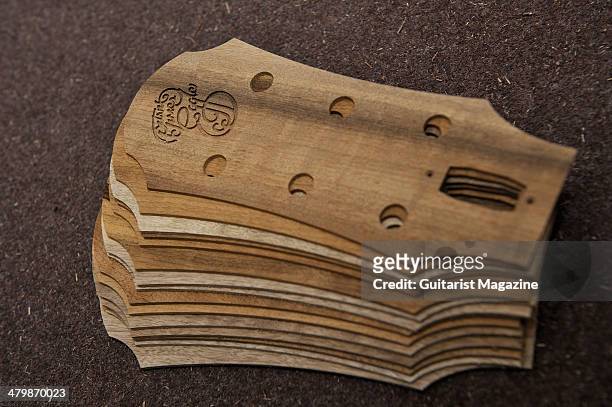 Stack of acoustic guitar headstock inlays at the Patrick James Eggle Guitars workshop, photographed during a shoot for Guitarist Magazine/Future via...