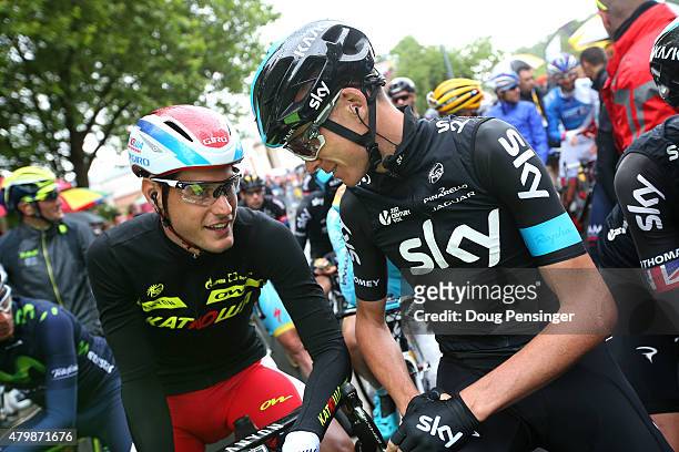 Jacopo Guarnieri of Italy and Team Katusha and Chris Froome of Great Britain and Team Sky chat prior to stage five of the 2015 Tour de France, a...