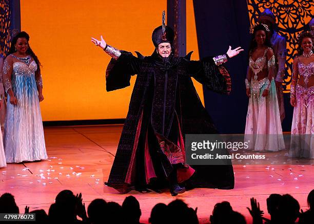 Actor Jonathan Freeman takes a bow during curtain call at the the "Aladdin" On Broadway Opening Night at New Amsterdam Theatre on March 20, 2014 in...