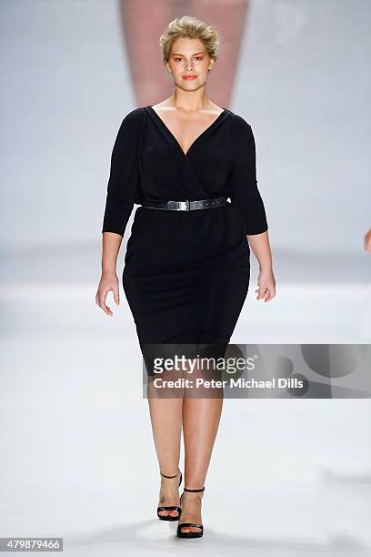Model Angelina Kirsch walks the runway at the Minx by Eva Lutz show during the Mercedes-Benz Fashion Week Berlin Spring/Summer 2016 at Brandenburg...