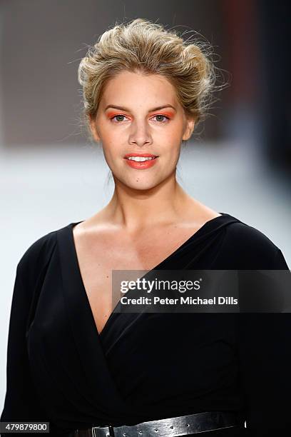 Model Angelina Kirsch walks the runway at the Minx by Eva Lutz show during the Mercedes-Benz Fashion Week Berlin Spring/Summer 2016 at Brandenburg...