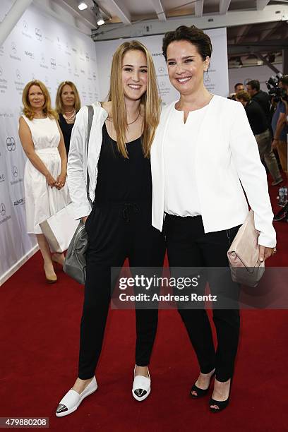 Luka Teresa-Gerda Kloser and Desiree Nosbusch attend the Minx by Eva Lutz show during the Mercedes-Benz Fashion Week Berlin Spring/Summer 2016 at...