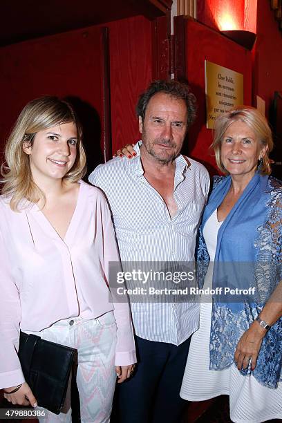 French actor and Director of Theatre Hebertot Francis Lombrail standing between Miss Alain Flammarion , Suzanna, and her daughter attend the Franck...