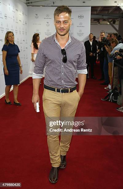 Tom Wlaschiha attends the Minx by Eva Lutz show during the Mercedes-Benz Fashion Week Berlin Spring/Summer 2016 at Brandenburg Gate on July 8, 2015...