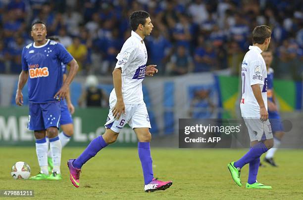 Defensor Sporting's players celebrate at the end of the Libertadores Cup match Brazil's Cruzeiro vs Uruguay's Defensor Sporting at Mineirao Stadium...