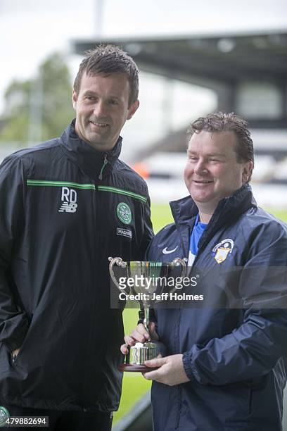 Morton FC kit man Andy Bryan with Celtic manager Ronny Deila ahead of his testimonial game at the Pre Season Friendly between Celtic and FK Dukla...