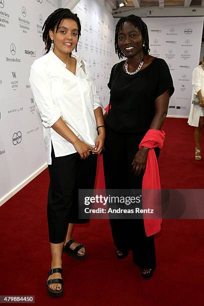 Auma Obama and Akini Obama attend the Minx by Eva Lutz show during the Mercedes-Benz Fashion Week Berlin Spring/Summer 2016 at Brandenburg Gate on...