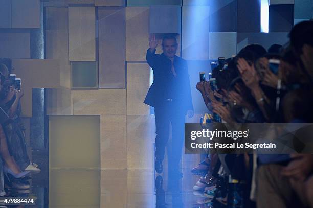 Elie Saab poses on the runway during the Elie Saab show as part of Paris Fashion Week Haute Couture Fall/Winter 2015/2016 on July 8, 2015 in Paris,...