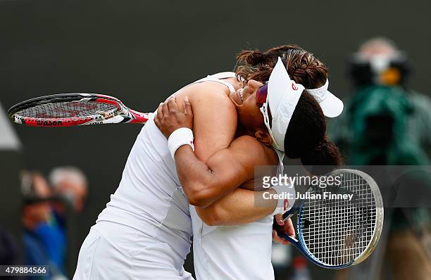 Raquel Kops-Jones of the United States and Abigail Spears of the United States celebrate winning the Ladies' Doubles Quarter Final match against...