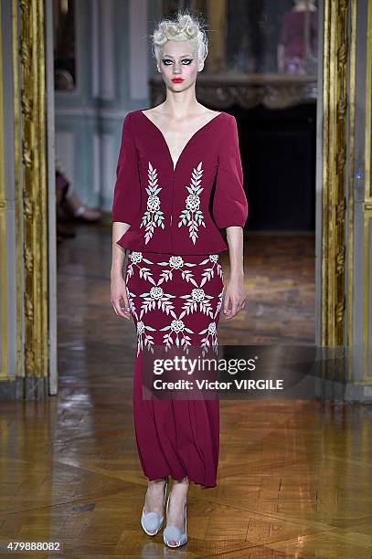 Model walks the runway during the Ulyana Sergeenko show as part of Paris Fashion Week Haute Couture Fall/Winter 2015/2016 on July 5, 2015 in Paris,...