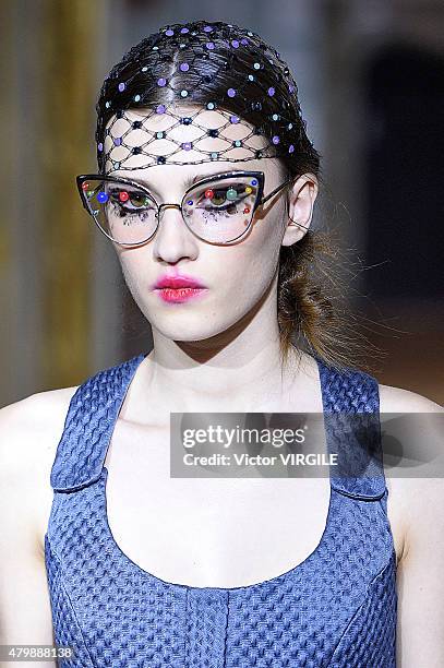 Model walks the runway during the Ulyana Sergeenko show as part of Paris Fashion Week Haute Couture Fall/Winter 2015/2016 on July 5, 2015 in Paris,...