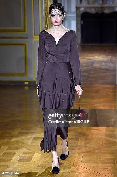 Model walks the runway during the Ulyana Sergeenko show as part of Paris Fashion Week Haute Couture Fall/Winter 2015/2016 on July 5, 2015 in Paris,...