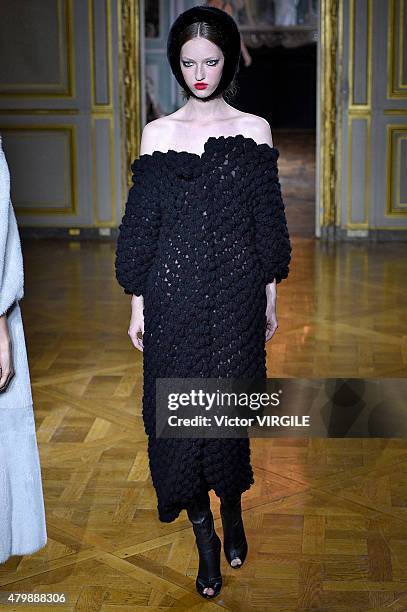 Model walks the runway during the Ulyana Sergeenko show as part of Paris Fashion Week Haute Couture Fall/Winter 2015/2016 on July 5, 2015 in Paris,...