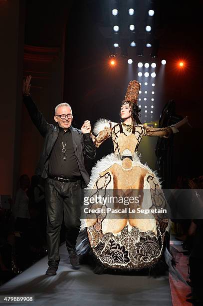 Jean Paul Gaultier and a model walk the runway during the Jean Paul Gaultier show as part of Paris Fashion Week Haute Couture Fall/Winter 2015/2016...