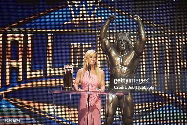 Professional Wrestling: WWE Hall of Fame Induction: Dana Warrior at podium with Ultimate Warrior statue behind her during ceremony at SAP Center. San...