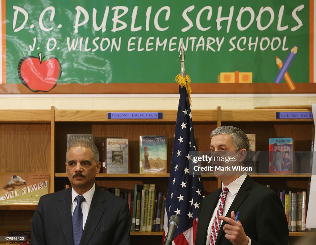 Eric Holder And Arne Duncan Visit Washington DC Elementary School