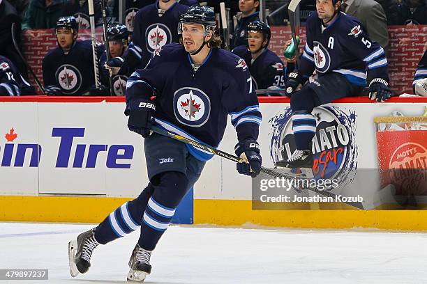 Keaton Ellerby of the Winnipeg Jets keeps an eye on the play during first period action against the Vancouver Canucks at the MTS Centre on March 12,...